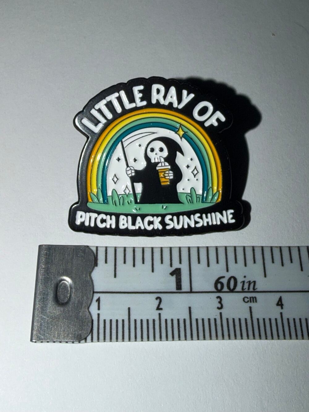 Little Ray of Pitch Black Sunshine Grim Reaper Script Pin Brooch